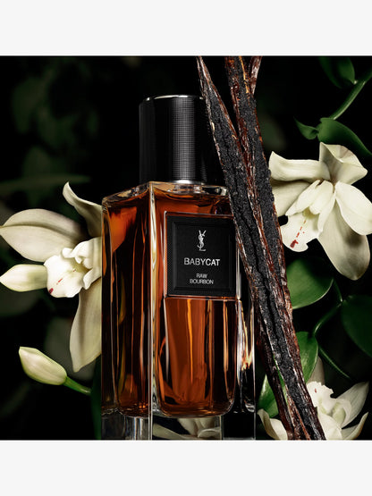 Yves Saint Laurent Babycat with vanilla pods and white flowers