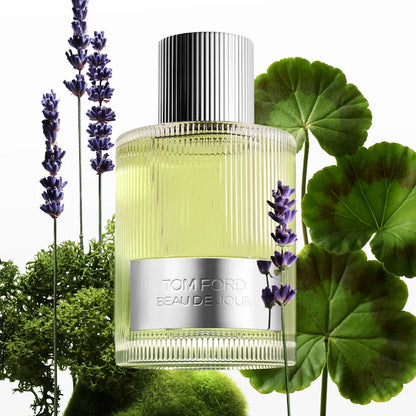 Tom Ford Beau de Jour Eau de Parfum among lavender flowers, green leaves and moss.