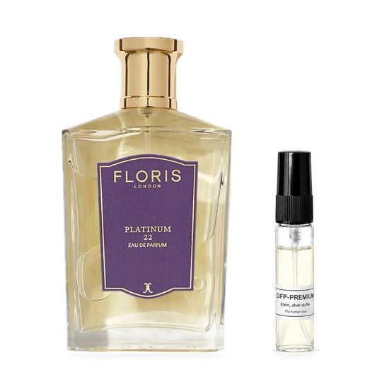 Floris Platinum 22: Originalflakon neben einer DFP Parfumprobe im Glaszerstäuber mit schwarzer Kappe auf weissem Hintergrund.