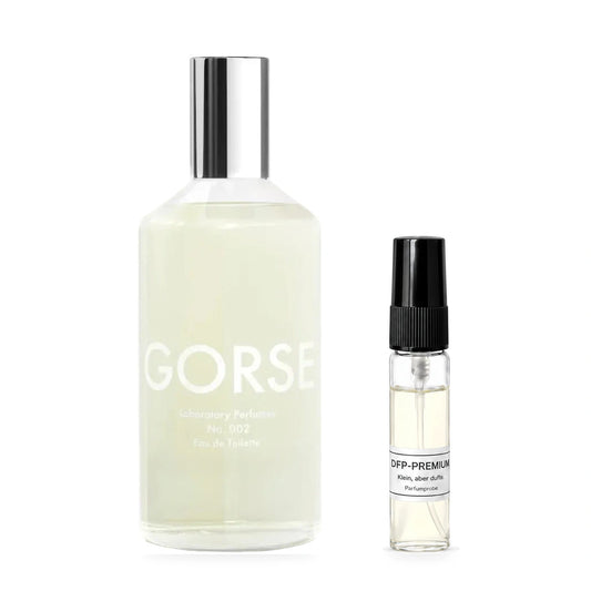 Laboratory Perfumes Gorse: Originalflakon neben einer DFP Parfumprobe im Glaszerstäuber mit schwarzer Kappe auf weissem Hintergrund.