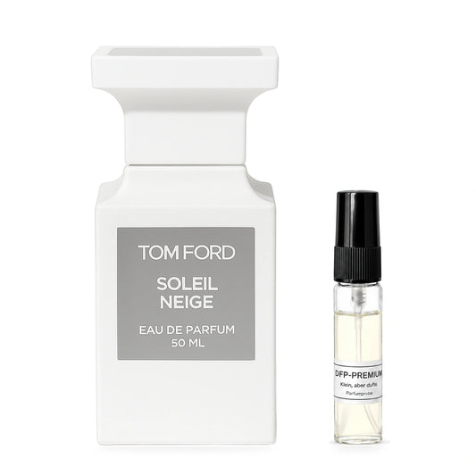Tom Ford Soleil Neige: Originalflakon neben einer DFP Parfumprobe im Glaszerstäuber mit schwarzer Kappe auf weissem Hintergrund.