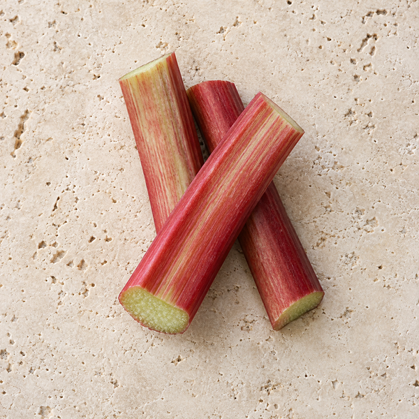 Red rhubarb stalks with pale cut ends