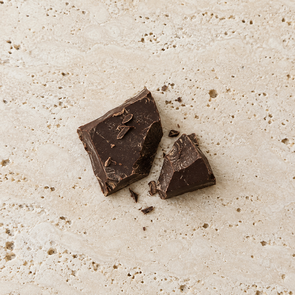 Broken dark chocolate with fine shavings