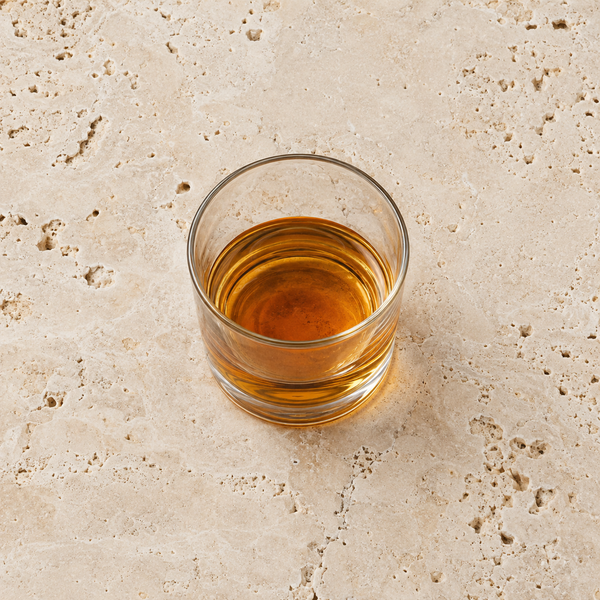 Amber-coloured spirit in a plain glass