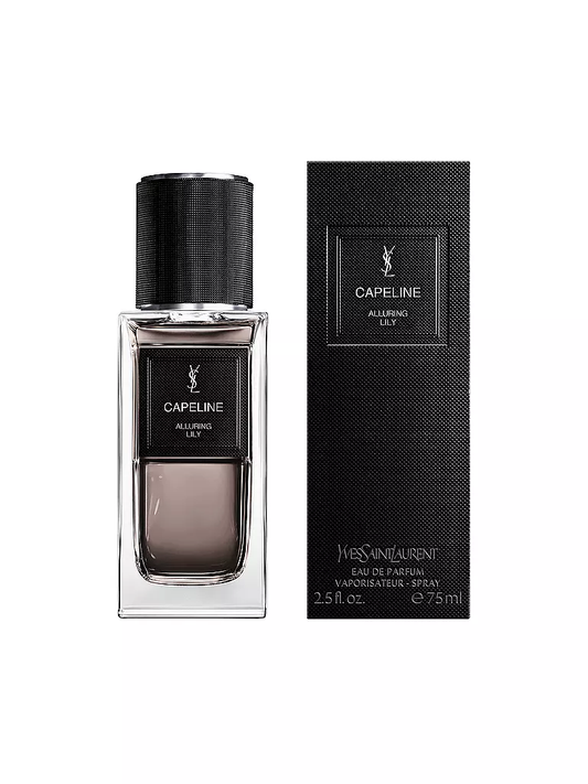 Yves Saint Laurent Capeline Alluring Lily: Originalflakon mit schwarzem Verschluss neben der schwarzen Originalschachtel auf weissem Hintergrund.